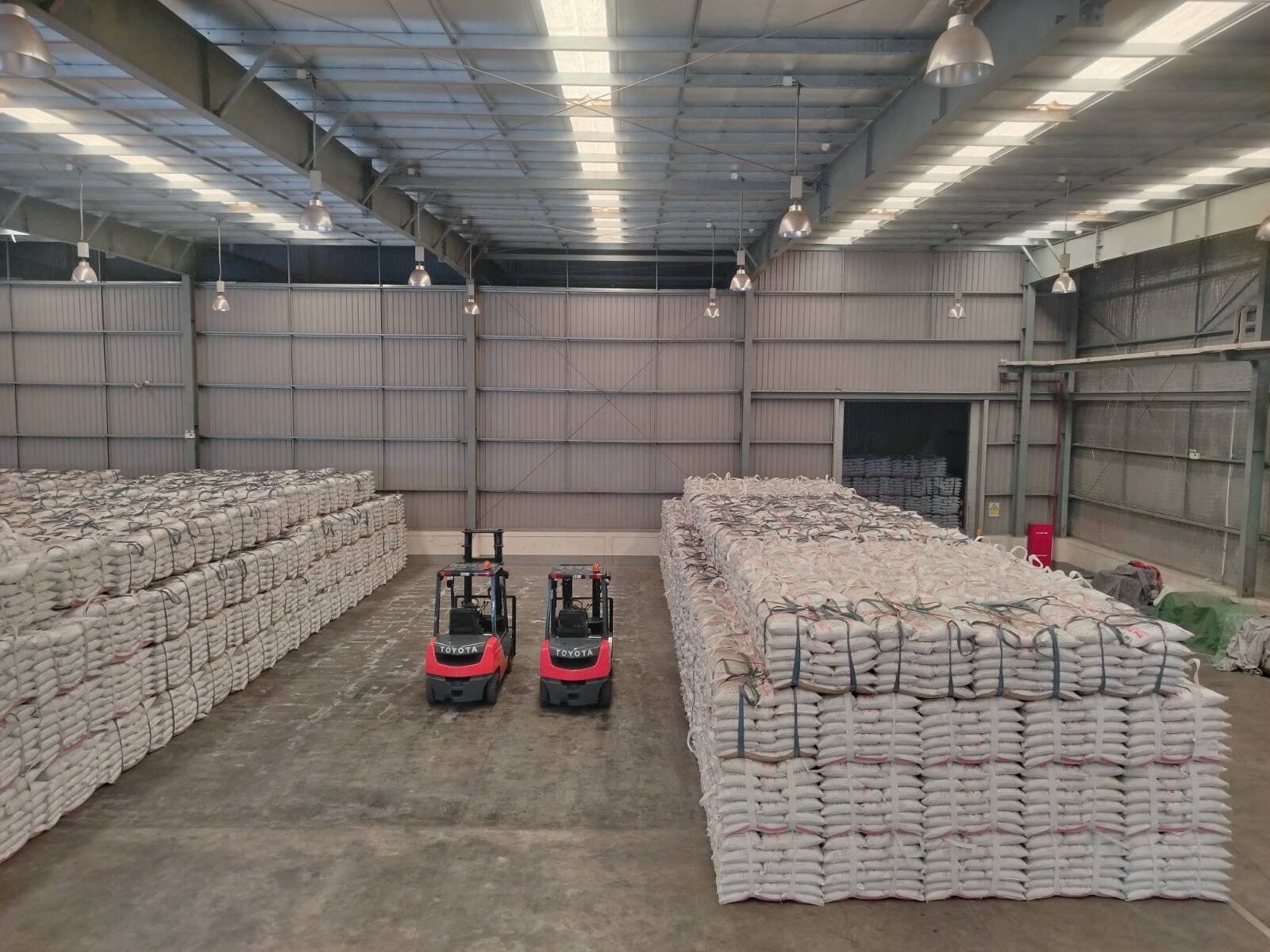 Shwe Myay Thee fertilizer warehouse with forklifts at the Thilawa plant